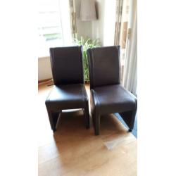 4 nette eetkamerstoelen kunstleder met wieltjes
