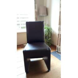 4 nette eetkamerstoelen kunstleder met wieltjes