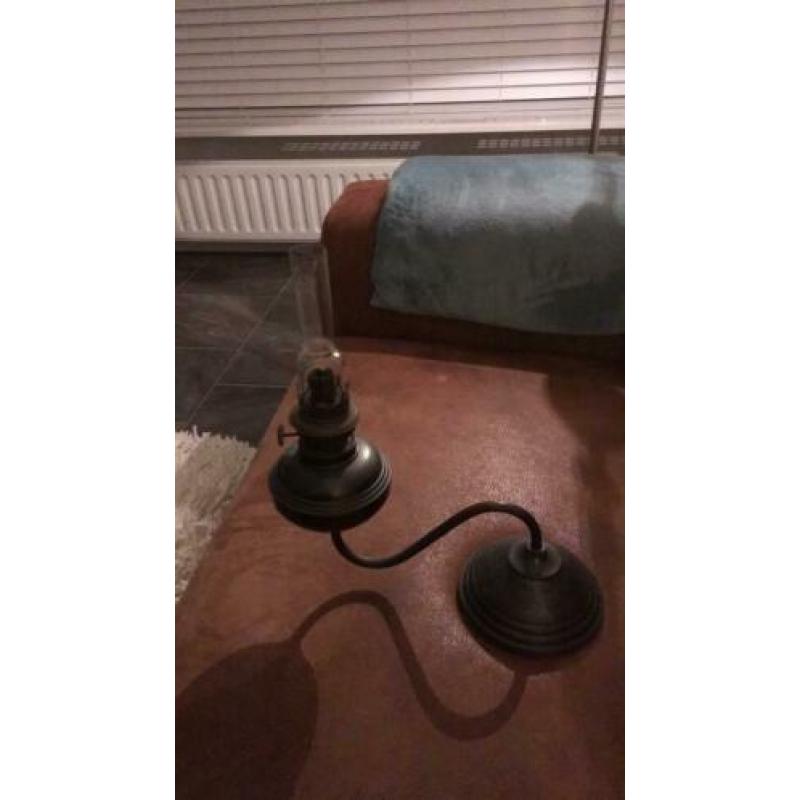 Oude draaiende olielamp