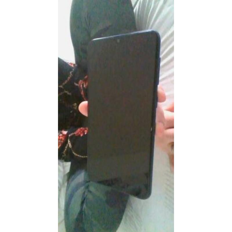 Samsung galaxy A10 blauw, met doos en oplader.