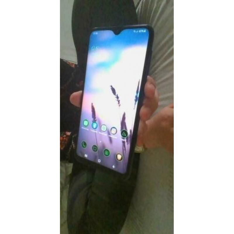 Samsung galaxy A10 blauw, met doos en oplader.