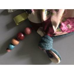Tutdoek met ring, kralen en belletje