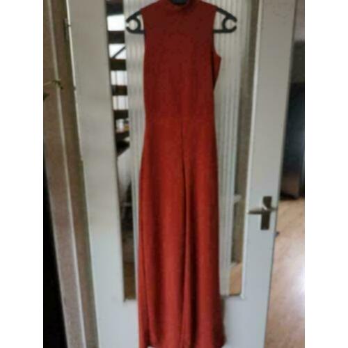 Mooie roestbruine jumpsuit met open rug met flared pijp 38