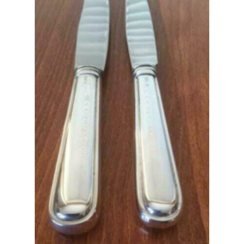 2 x zilveren dinner messen ,enkel rond