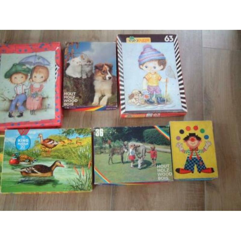 8 oude kinder puzzels clown panda kippen poezen hond enz