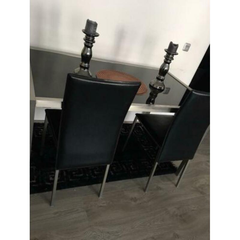 Eettafel met 4 leer stoelen 140*80 cm