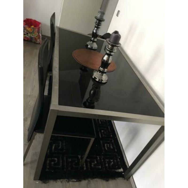 Eettafel met 4 leer stoelen 140*80 cm