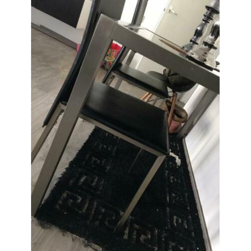 Eettafel met 4 leer stoelen 140*80 cm