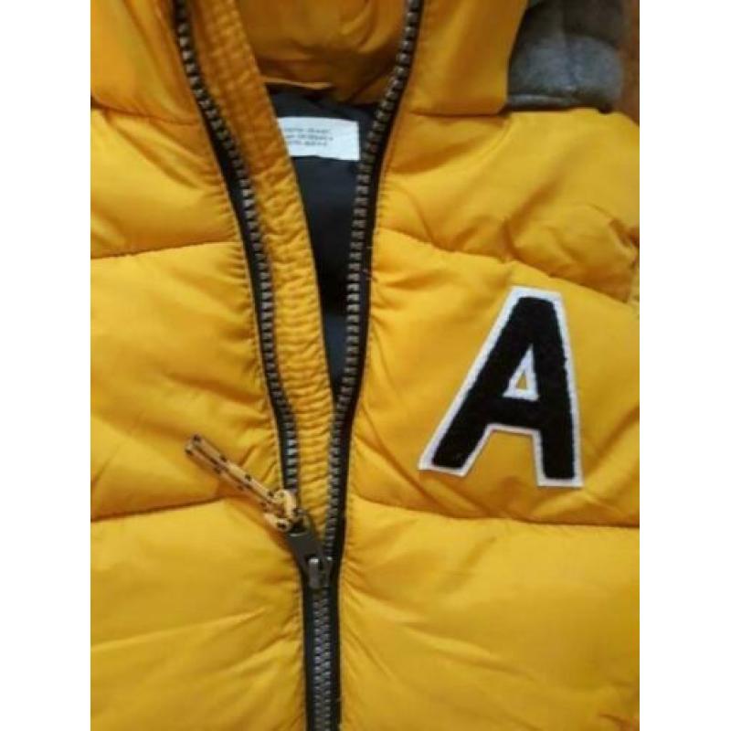NIEUW gele BODYWARMER BODY WARMER capuchon 110 116