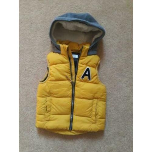 NIEUW gele BODYWARMER BODY WARMER capuchon 110 116