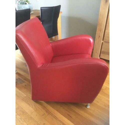 Mooie rood leren fauteuil.