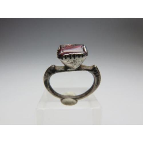 Medieval silver children's ring with garnet inlay
