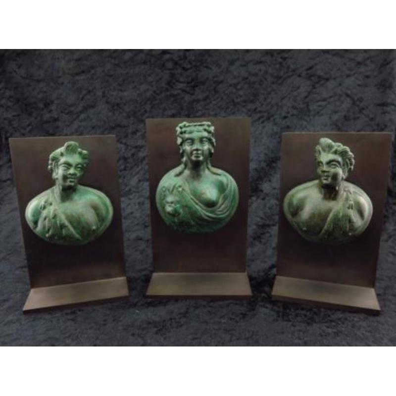 Set of three Roman bronze appliques of a noble women with tw