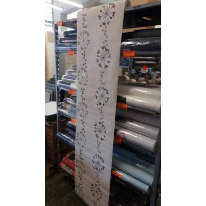 Beige bruin bloem vliesbehang €5,50 op=op