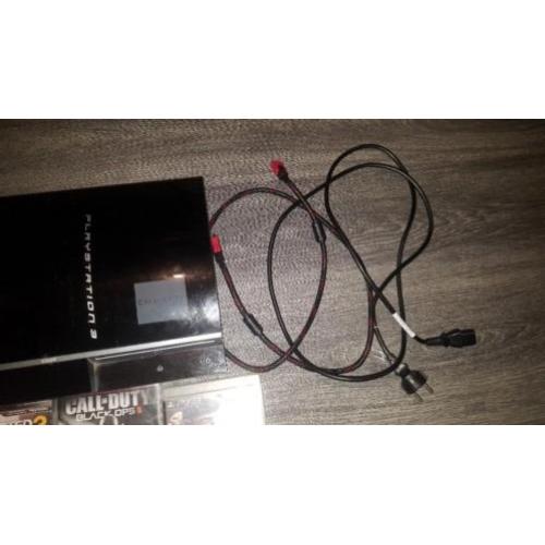 Playstation3 met 2 controllers en 15 games
