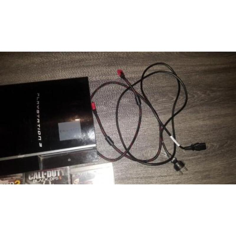 Playstation3 met 2 controllers en 15 games