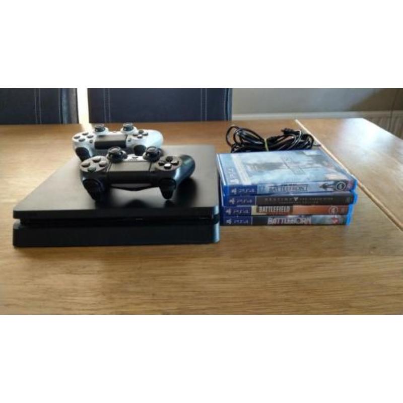 PS 4 Slim 1TB + 2 controllers + 4 Games