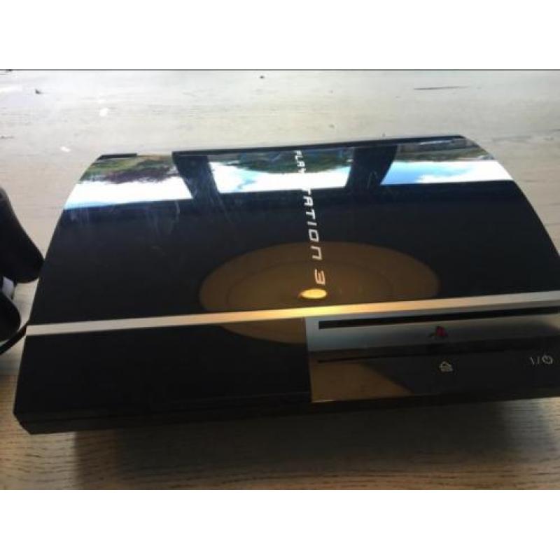 PlayStation 3 met oplader en 2 controlers en camera