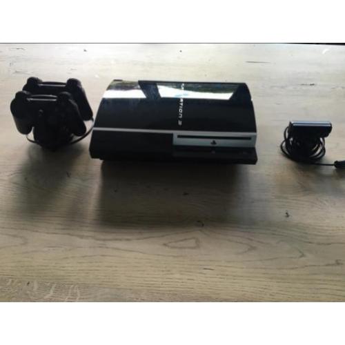 PlayStation 3 met oplader en 2 controlers en camera