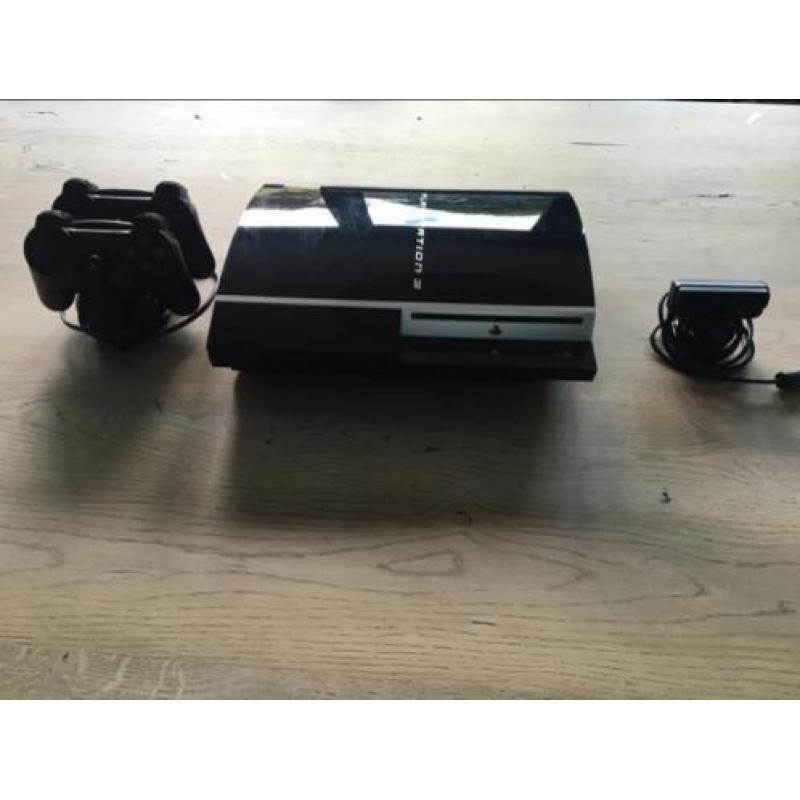 PlayStation 3 met oplader en 2 controlers en camera