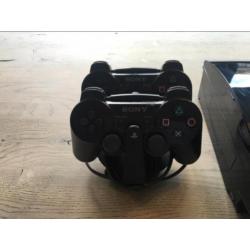 PlayStation 3 met oplader en 2 controlers en camera