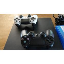 PS 4 Slim 1TB + 2 controllers + 4 Games